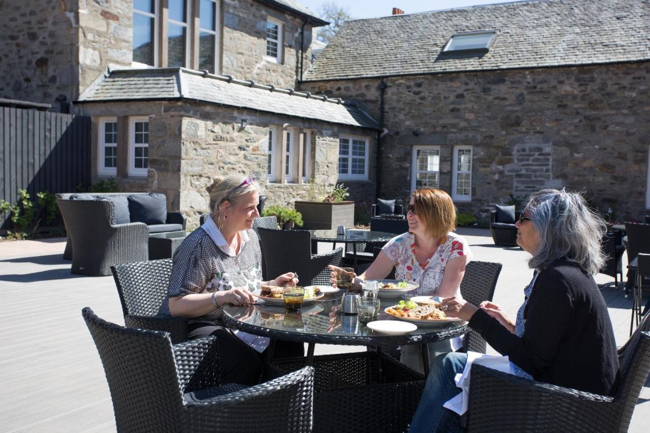 Dunalastair Hotel Suites Kinloch Rannoch Dış mekan fotoğraf The courtyard at the Old Manse
